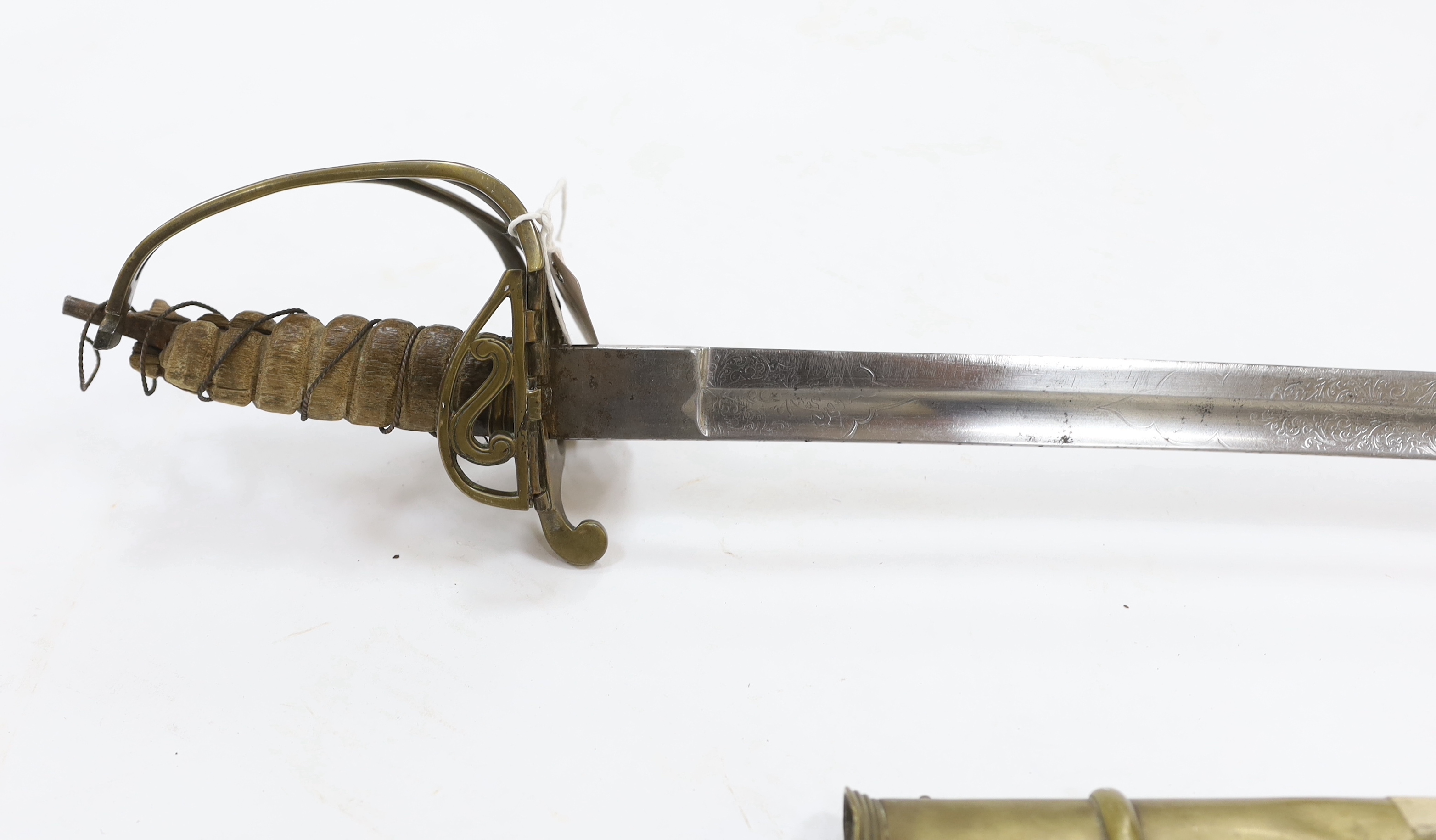 A scarce 1845 pattern infantry officer’s sword to the Penang Police, with regulation hilt, incomplete in its brass scabbard, blade 82cm